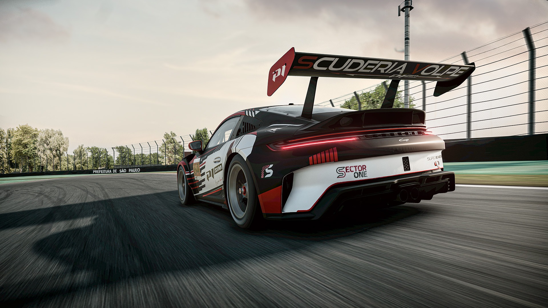 ARL-Porsche-Cup-2026-Interlagos-T1-low La Porsche engagée par la SV ARL Porsche Cup 2026, vue d'arrière, dans le premier virage du circuit d'Interlagos